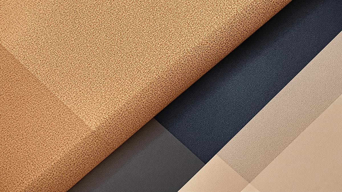 Abstract composition of textured suede surface with geometric cleaning elements, soft lighting, and neutral earth tones with navy and gray accents.